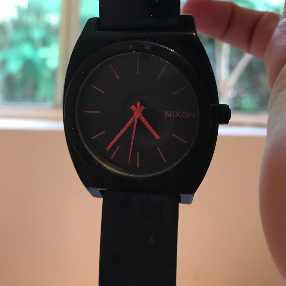 Black and hot pink Nixon