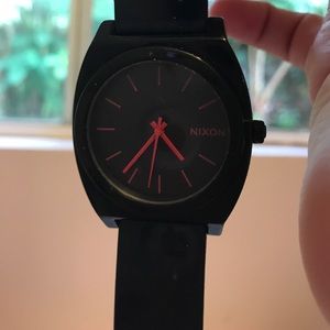 Black and hot pink Nixon