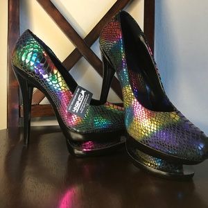A rainbow colored platform high-heeled shoe w/tag