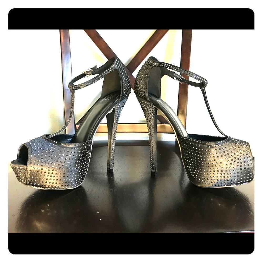 Black studded high-heeled (never been worn)