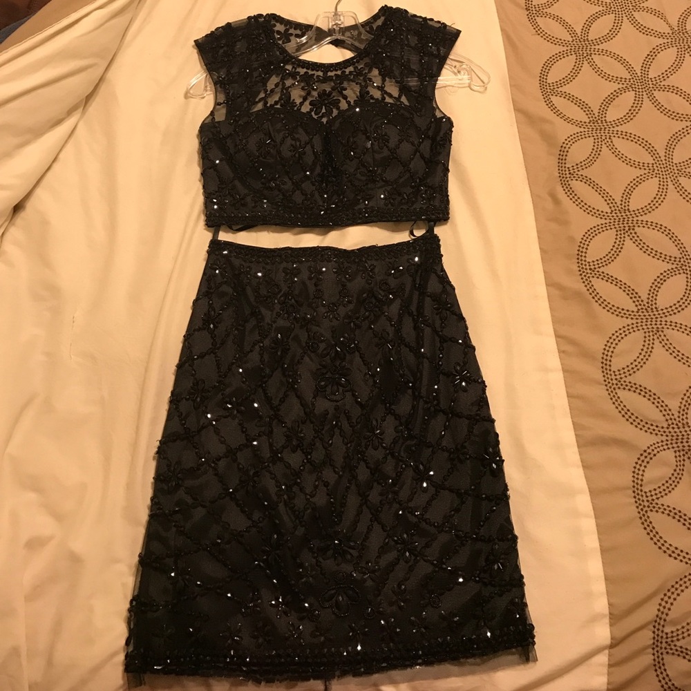 Black beaded homecoming dress.  Only worn once.