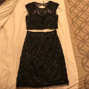Black beaded homecoming dress.  Only worn once.