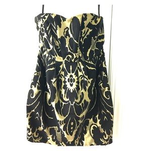 Black and gold strapless cocktail dress