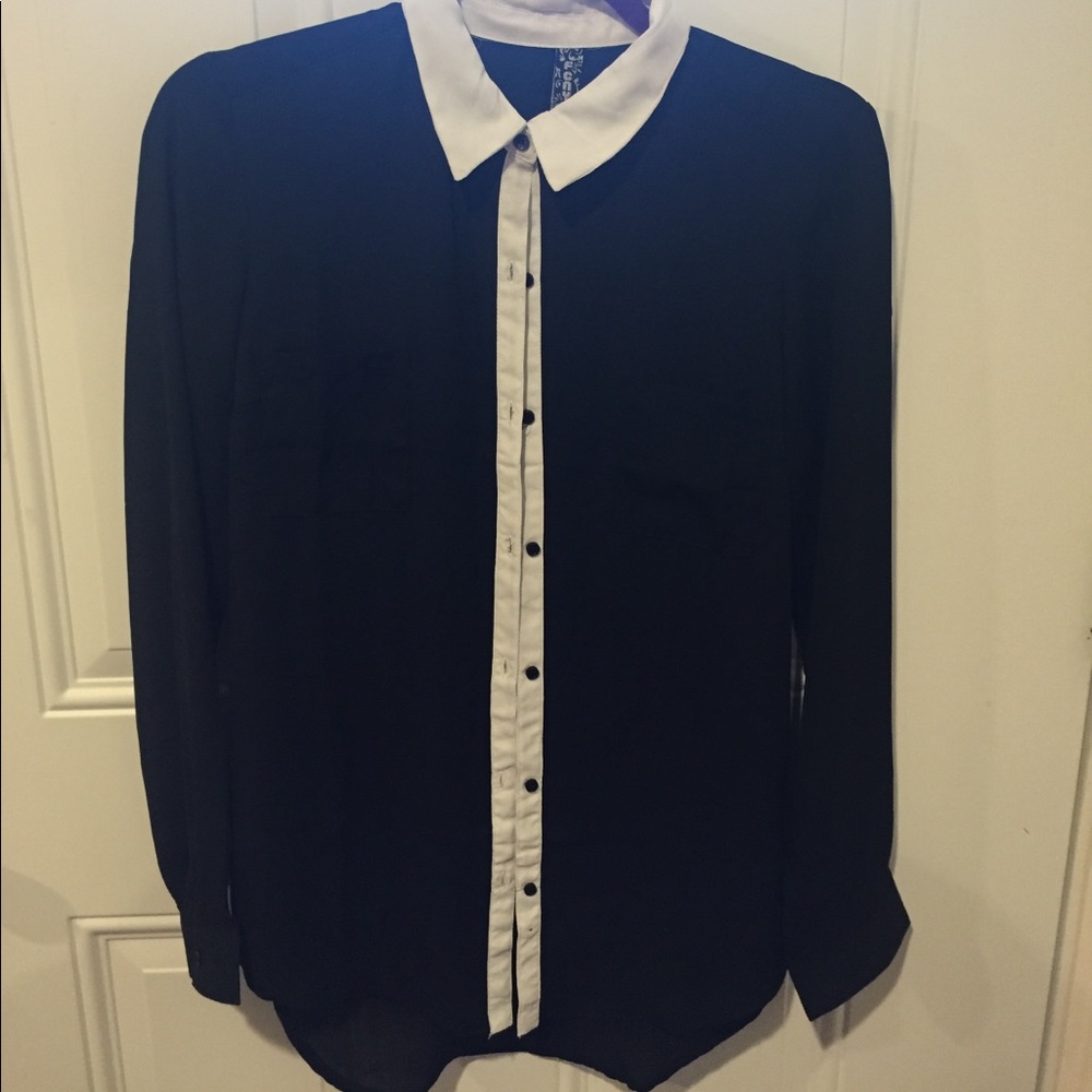 Sheer black & white long sleeve button up blouse.