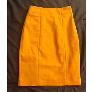 Mustard yellow form fitting pencil skirt