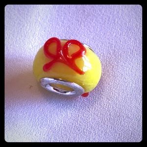 Yellow Glass Bead Charm with Red Ribbon