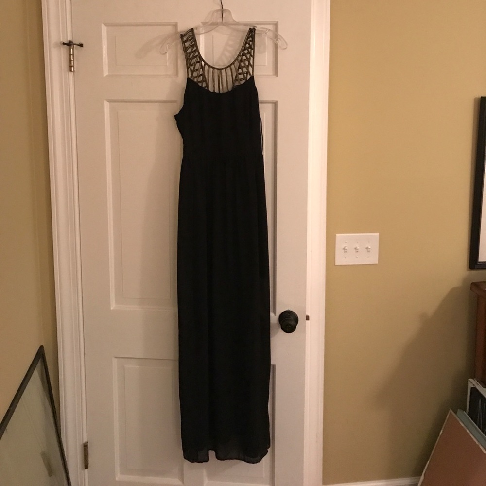 Black maxi dress with gold neck and strap detail