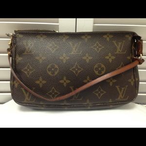 Louis Vuitton wristband hand bag logos