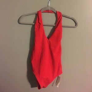 Red body suit size M