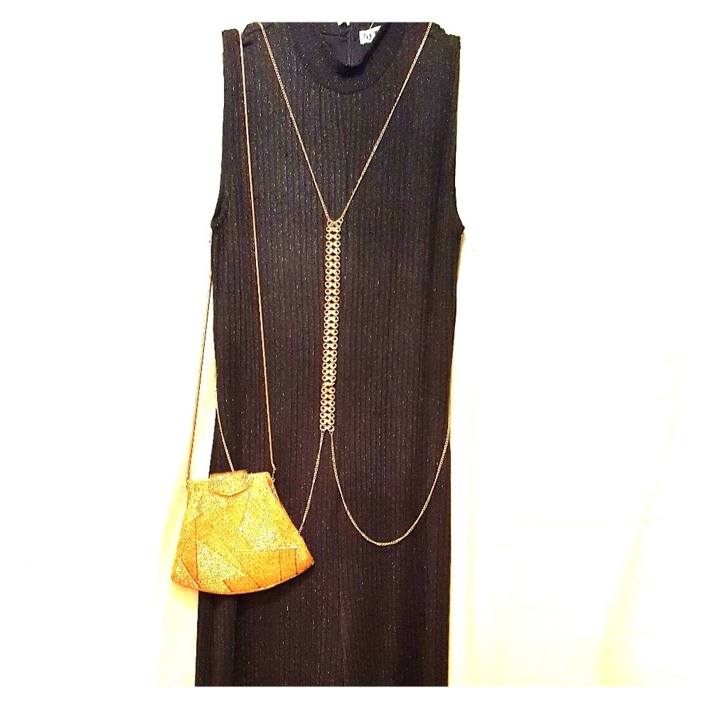 Black jumpsuit/with the Gold  accessories