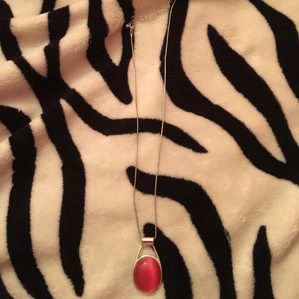 Necklace with large pink stone