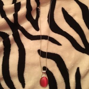 Necklace with large pink stone