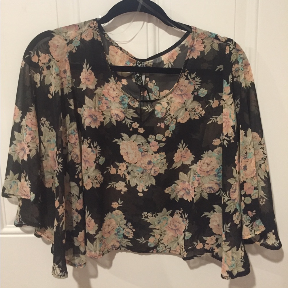 Sheer floral print flowing blouse. Brand new.