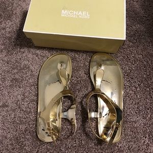 Worn- Gold jelly Michael Kors sandals size 10.