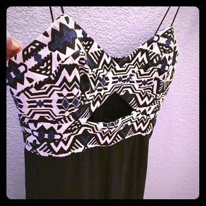 Jumpsuit super cute black/pattern w/front cut out!