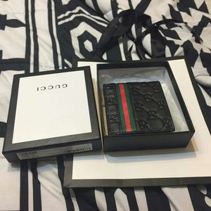 Authentic black and red Gucci wallet