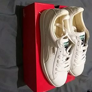 Size 10.5 all white Puma Sneakers new in the box