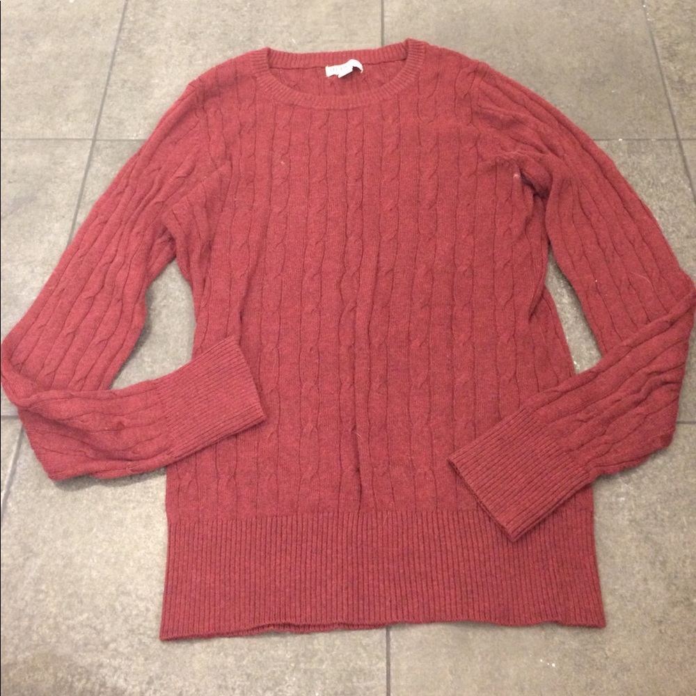Maroon sweater.