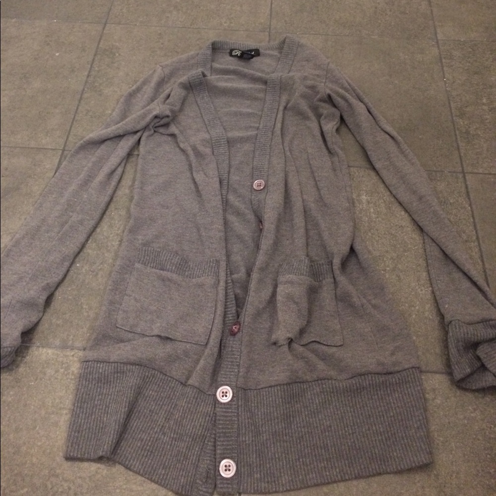 Grey cardigan.