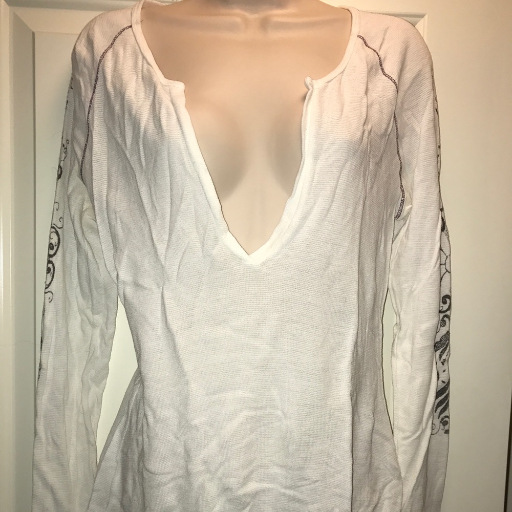 Yogi long sleeve cotton tee.