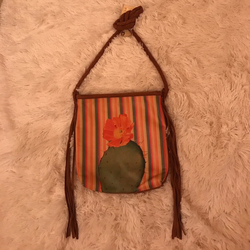 Real leather, crossbody cactus purse. Brand new.