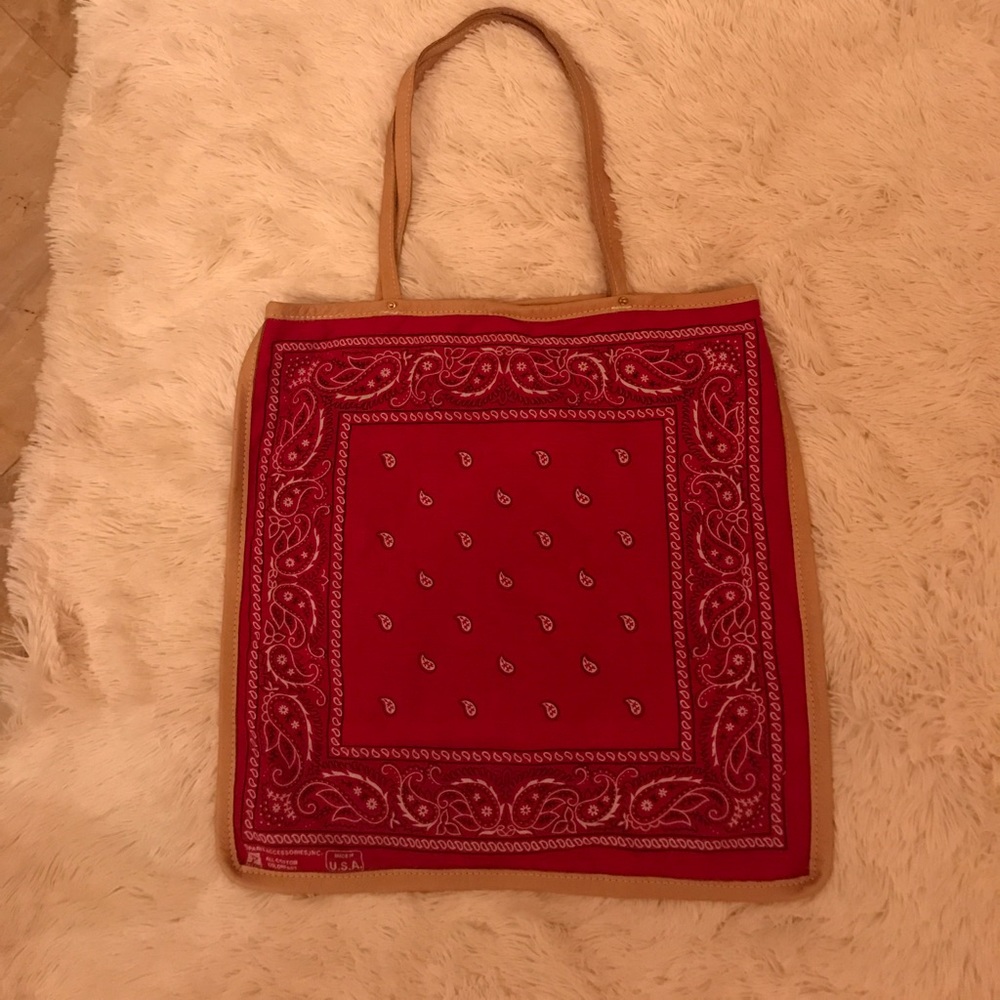 Brand new. Bandanna purse with real leather trim.
