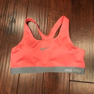 Coral Nike Pro sports bra