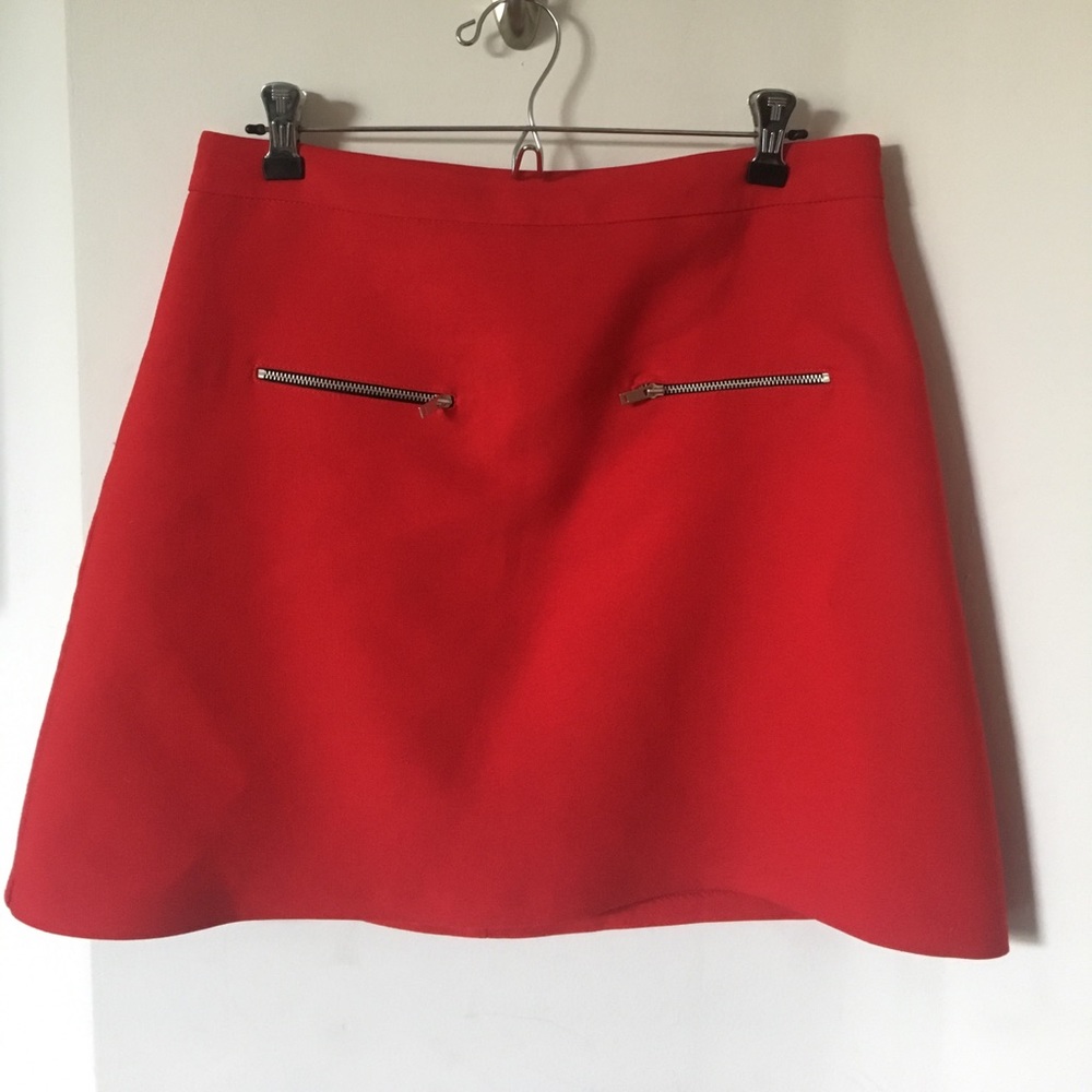 Red mini skirt with silver zippers