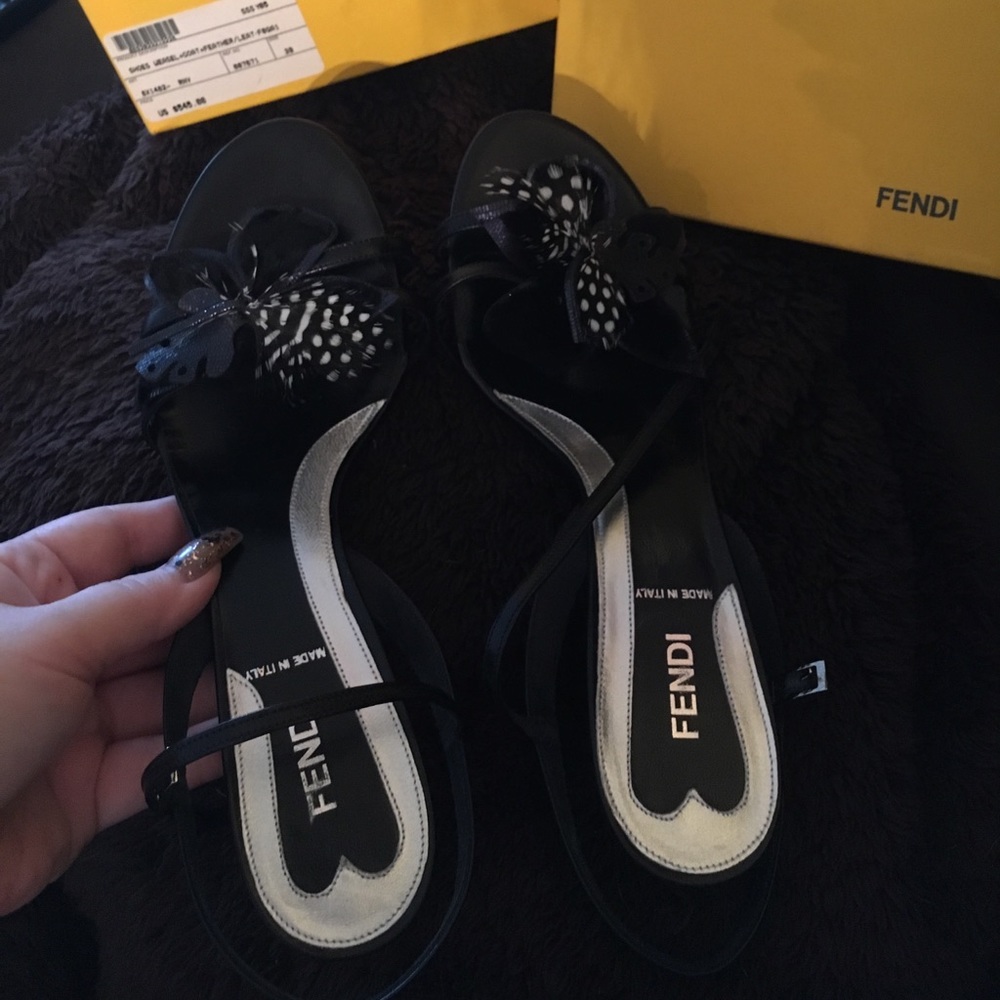 Absolutely stunning authentic fending strap heels