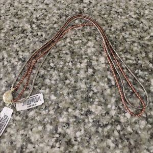 Club Monoco medal beaded necklace