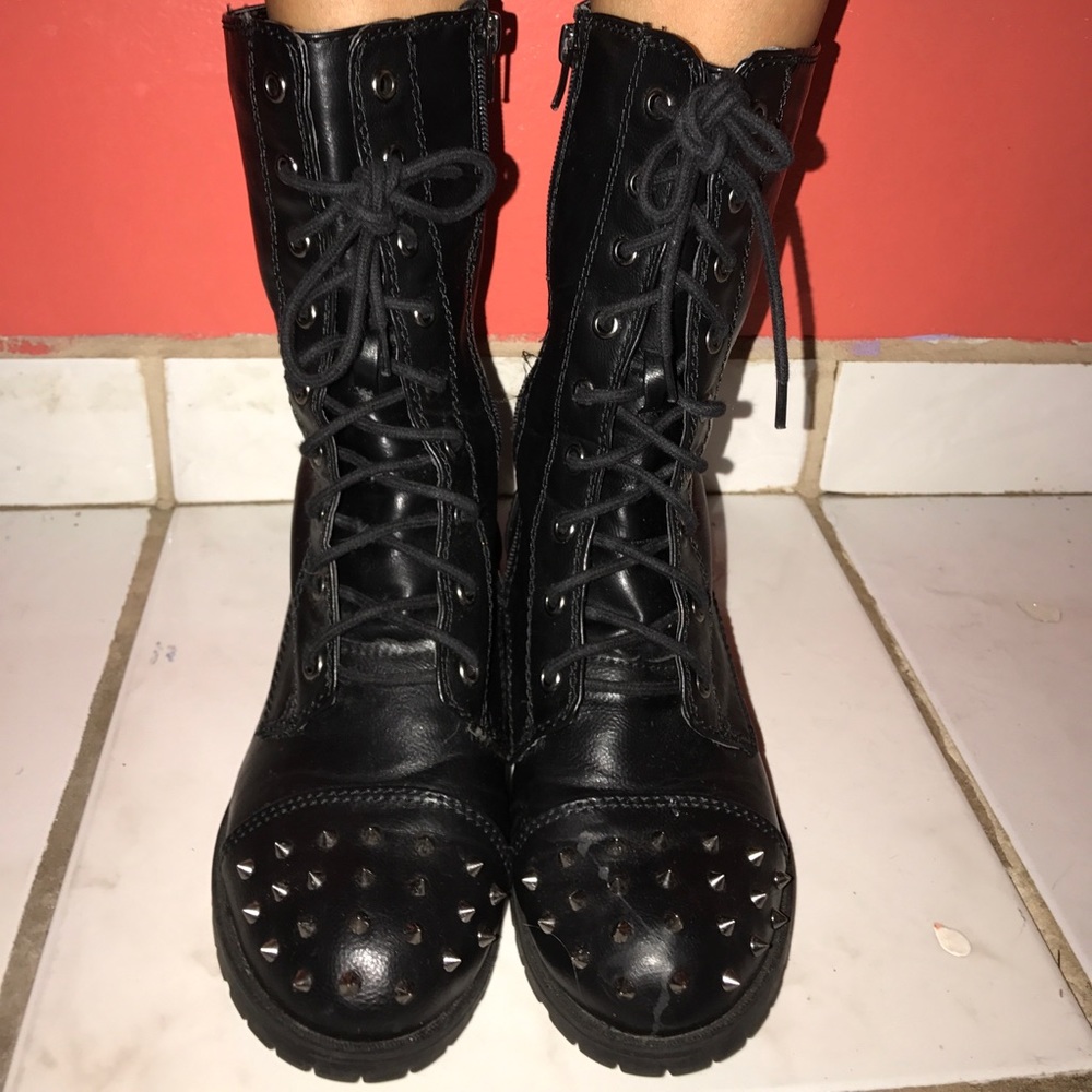 Black combat boots with silver studs