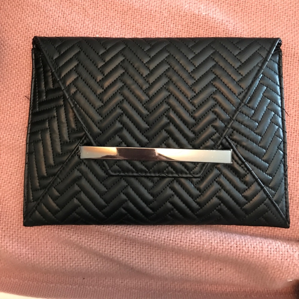 Black faux leather clutch and cross body