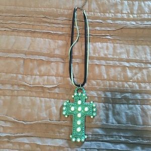 Turquoise cross necklace.