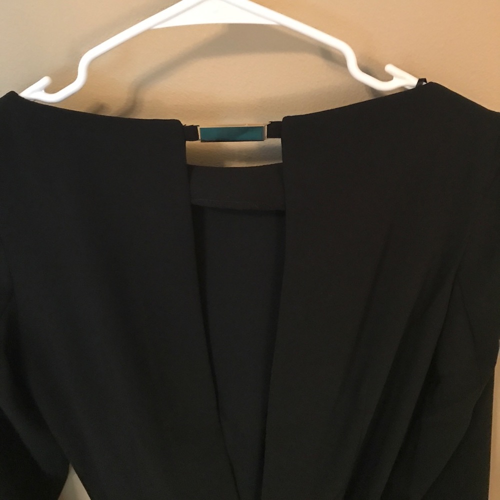 Brand new H&M black romper with long sleeves!