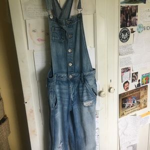 American eagle distressed jean overalls.