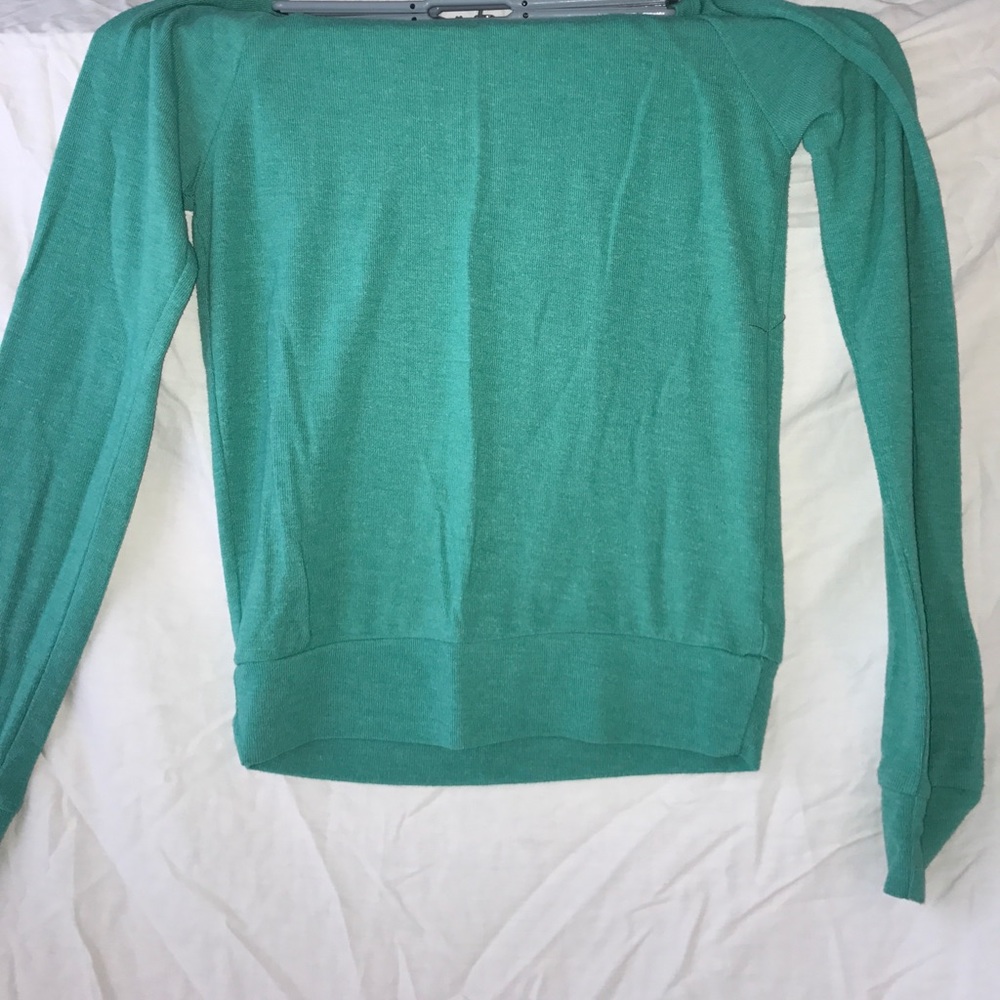 A turquoise long sleeve thick tee