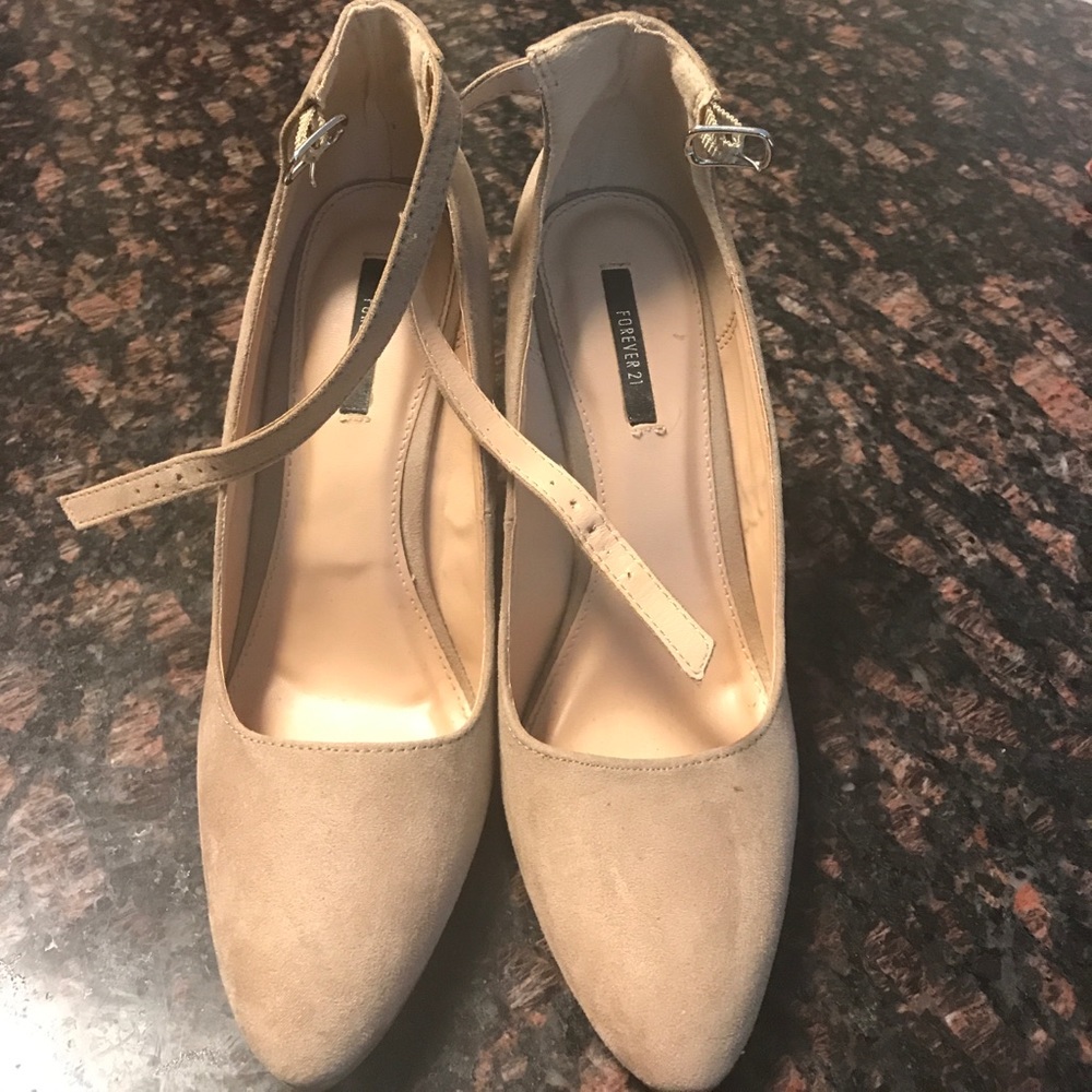 Barely used ankle strap Tan wedges.
