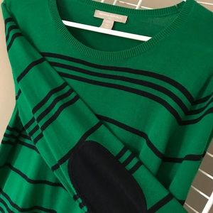 Striped sweater with elbow patches.