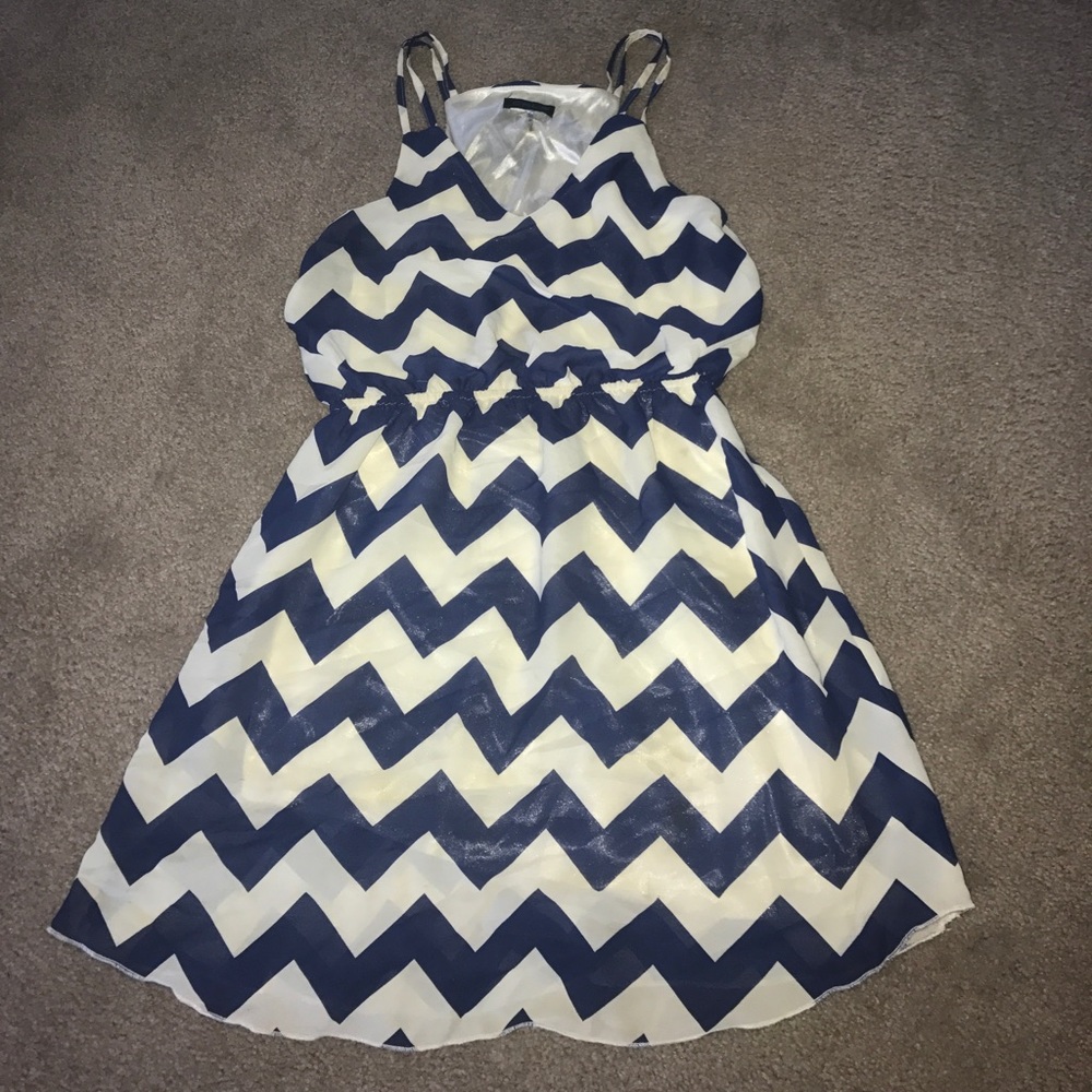 Navy blue and white womans dress