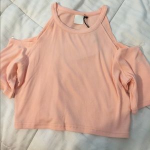 Pink tank with cut out shoulders