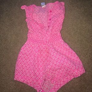 pink and white baby's romper