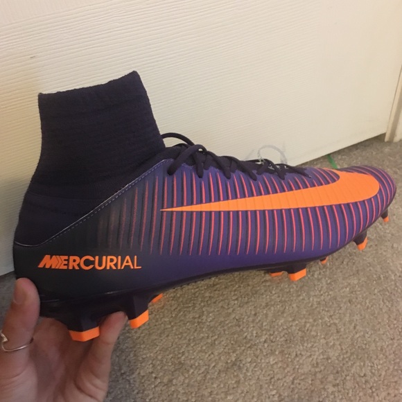 purple and orange cleats