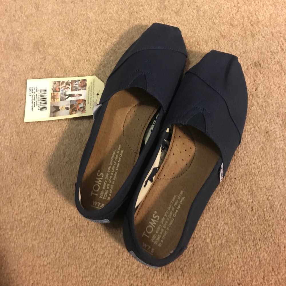 Brand new navy Toms.