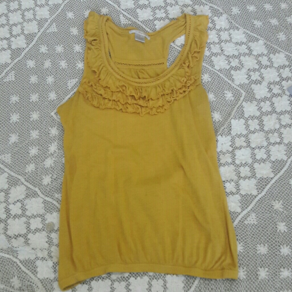 Super fun tank with ruffles and stitching detail!