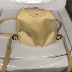 Authentic longchamp cream colored backpack