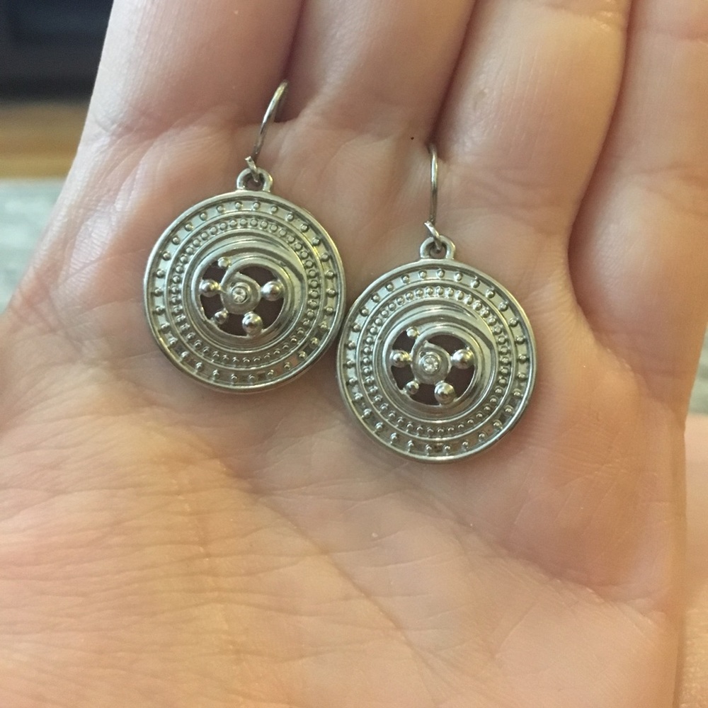 Circle silver earrings.