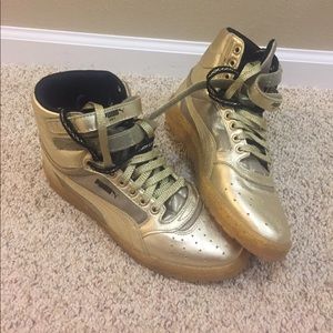 Gold Puma Hightop Sneakers