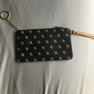 Dooney and Burke Wristlets. LIKE NEW.
