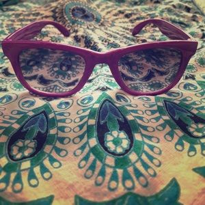 Purple sunglasses.