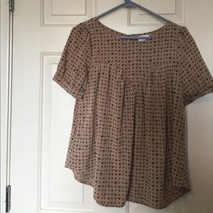 Light brown colored blouse with blue & black bows